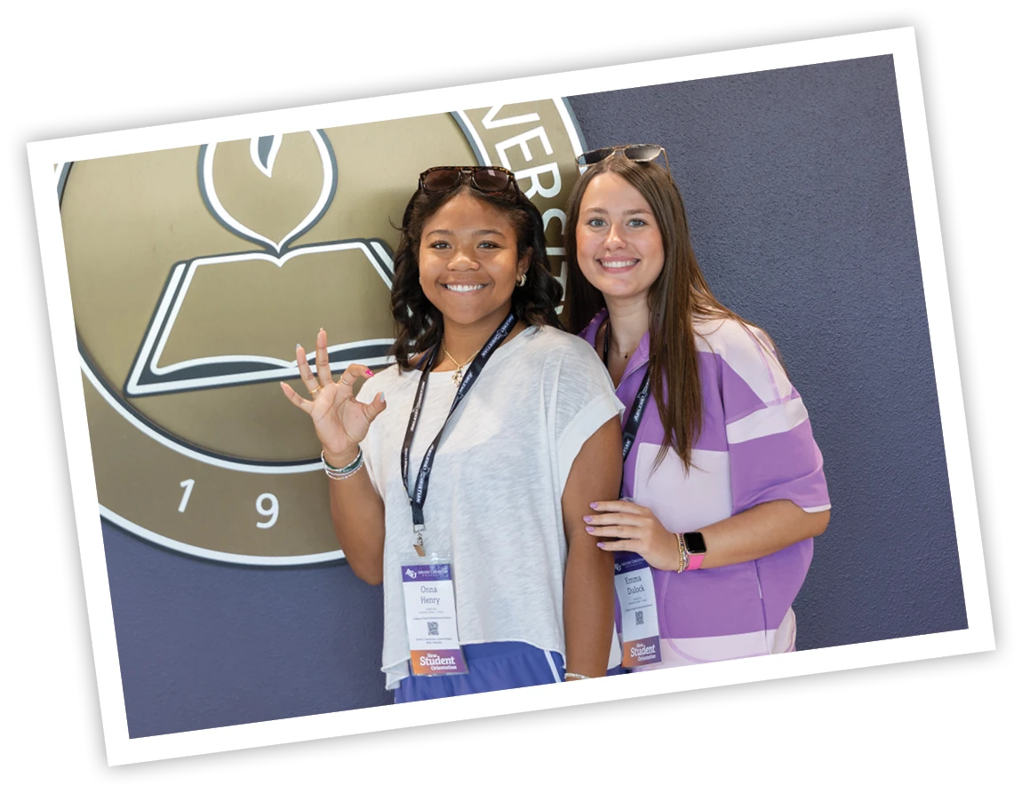Two prospective students pose together during an ACU visit event.